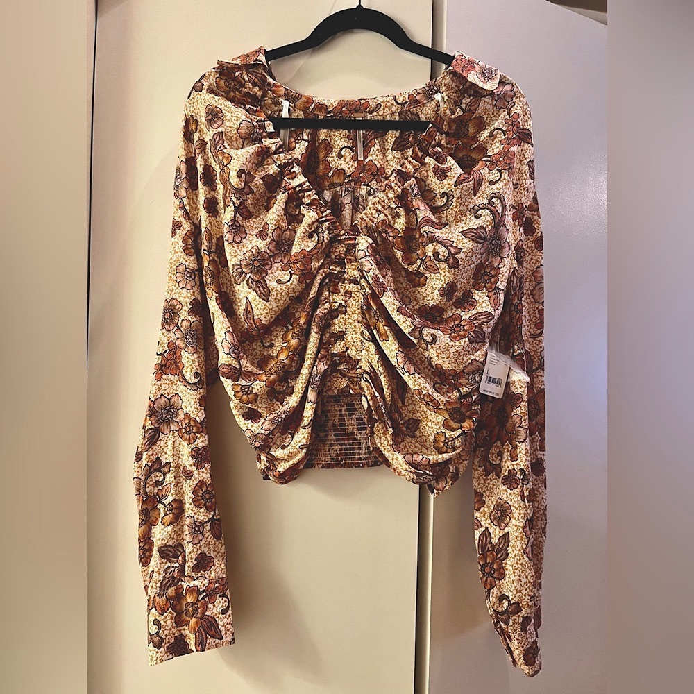 NWT Free People “I got you” printed silky top in Vintage Combo size L Large